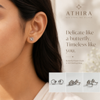 A close-up of a woman's ear wearing a small silver butterfly stud earring, with the brand name ATHIRA and product text 'Delicate like a butterfly, Timeless like you.' on a soft light background.