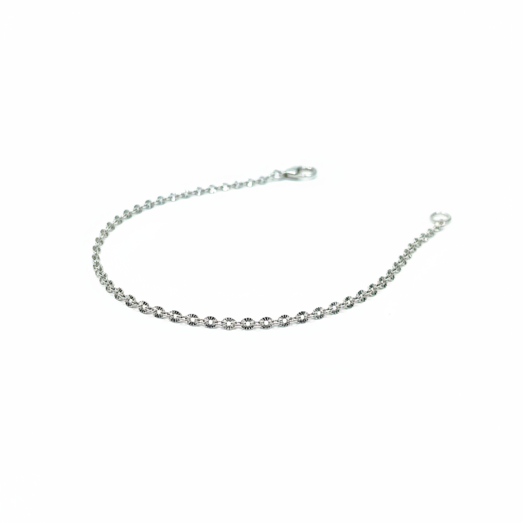 Shining Rhodium Plated Disc Anklet — overhead studio shot on white background, faceted disc chain with rhodium-plated sterling silver finish