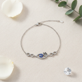 Infinity Evil Eye Bracelet — Flat Lay