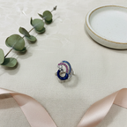 Peacock Toe Ring — Editorial Flat Lay