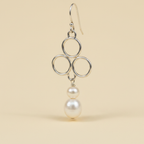 Sterling Silver Triple Circle Pearl Drop Earrings — Cream Background